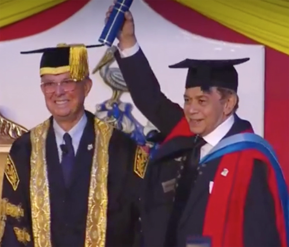 Monty Alexander, CD, receiving the Hon. Doctorate of Letters degree from UWI Mona Campus Chancellor Robert Bermudez at the 2018 graduation ceremonies on Nov. 3, 2018.
