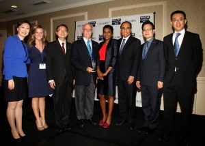  ICN founder Felicia Persaud, 4th from right, with Mike Ronan, vice president of government relations for the Caribbean, Latin America & Asia at RCCL, 4th from l.; Miguel Reyna, director, Port Business Development and Asset Management, 3rd from r;  Kara Coleman, news anchor of One Caribbean Television and ICN 2013 emcee, 2nd from left and the China and the Caribbean panellists including Li Li at L; Consul in charge of economic & commercial affairs of the Consulate General of China in New York, Xiaoguang Liu; 3rd from r. and Johnny Liu of the American Chinese Commerce Development Association at right. (Hayden Roger Celestin image) 