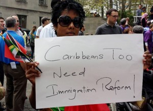 Felicia Persaud, the Caribbean-born executive of Hard Beat Communications, rallies for immigration reform on Oct. 5, 2013. (NAN Image) 
